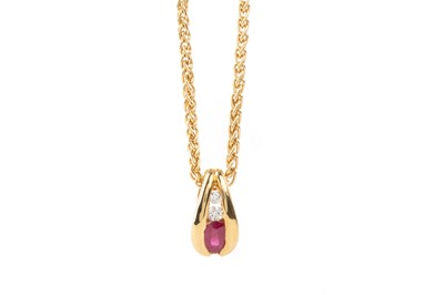 Lot 605 - RUBY AND DIAMOND PENDANT ON CHAIN