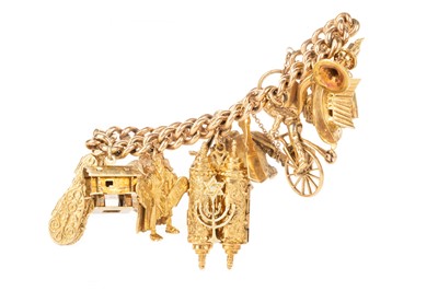 Lot 613 - IMPRESSIVE GOLD CHARM BRACELET