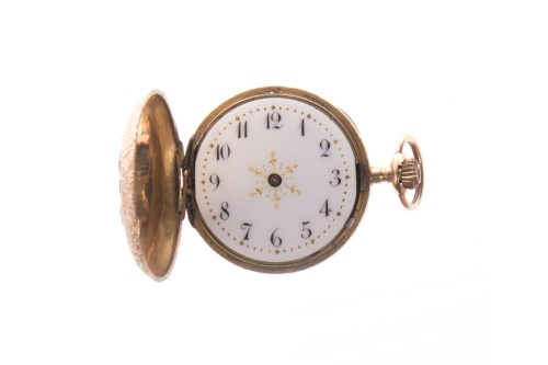 Lot 963 - LADY'S EIGHTEEN CARAT GOLD FOB WATCH the round...