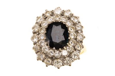 Lot 621 - SAPPHIRE AND DIAMOND CLUSTER RING
