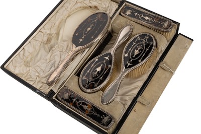 Lot 1169 - EDWARDIAN SILVER AND TORTOISESHELL DRESSING TABLE SET