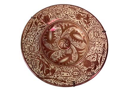 Lot 312 - FOUR HISPANO MORESQUE CERAMIC DISHES