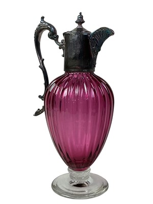 Lot 315 - VICTORIAN CRANBERRY GLASS AND SILVER PLATED CLARET JUG