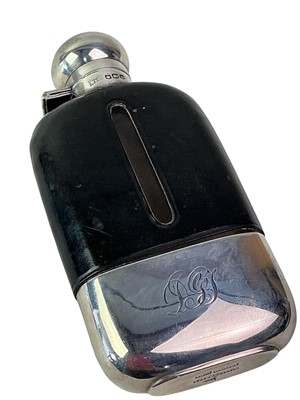 Lot 334 - SILVER AND LEATHER MOUNTED HIP FLASK