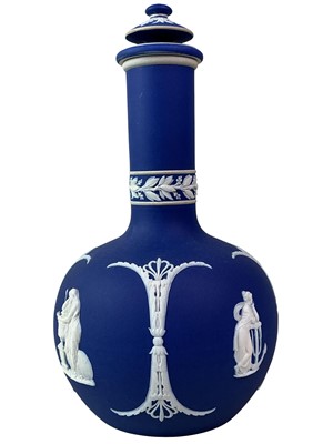 Lot 295 - WEDGWOOD JASPERWARE BOTTLE SHAPED VASE AND COVER