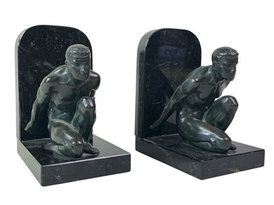 Lot 431 - PAIR OF MARBLE AND BRONZED METAL BOOKENDS