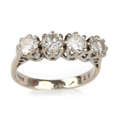 Lot 531 - DIAMOND FOUR STONE RING