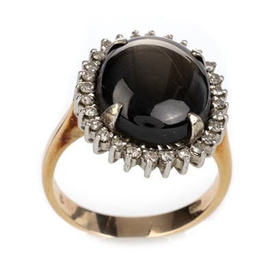 Lot 469 - BLACK SAPPHIRE AND DIAMOND RING