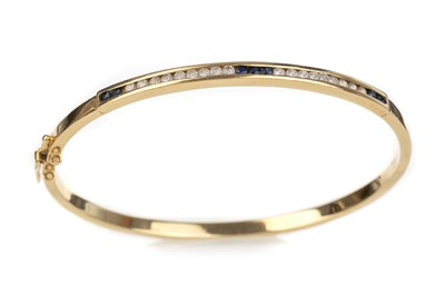 Lot 483 - SAPPHIRE AND CUBIC ZIRCONIA BANGLE
