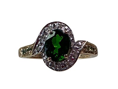Lot 609 - DEMANTIOD GARNET RING