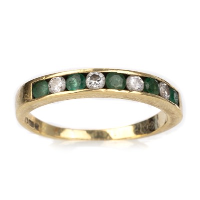 Lot 506 - EMERALD AND DIAMOND BAND