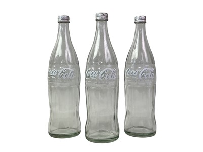 Lot 560 - GROUP OF TWELVE VINTAGE COCA-COLA GLASS BOTTLES