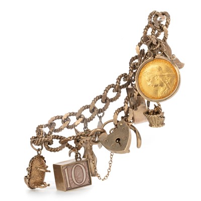 Lot 523 - GOLD CHARM BRACELET