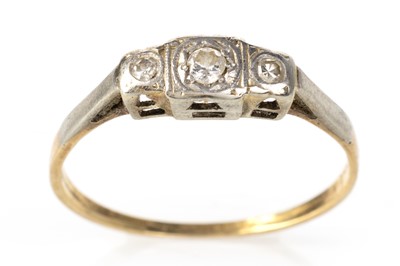 Lot 559 - DIAMOND THREE STONE RINGS