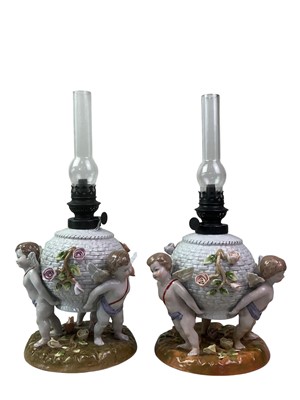 Lot 360 - PAIR OF DRESDEN CERAMIC OIL LAMPS