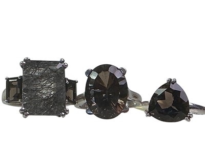 Lot 420 - SEVEN QUARTZ DRESS RINGS