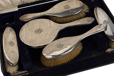 Lot 1214 - GEORGE V SILVER DRESSING TABLE SET