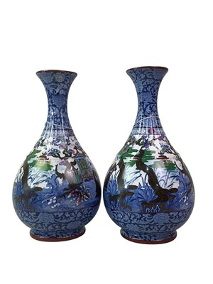 Lot 502 - PAIR OF CERAMIC BOTTLE SHAPED VASES