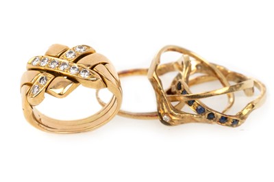 Lot 614 - TWO PUZZLE RINGS