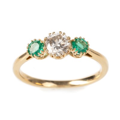Lot 423 - EMERALD AND DIAMOND THREE STONE RING