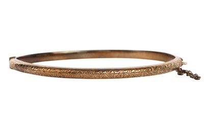 Lot 620 - GOLD ENGRAVED BANGLE