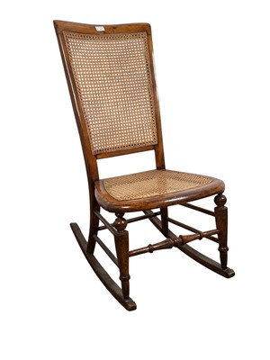 Lot 718 - MAHOGANY BERGERE ROCKING CHAIR