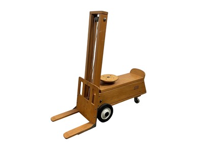 Lot 719 - CHILD'S ADVENTURE PLAYTHING WOODEN SIT ON TOY