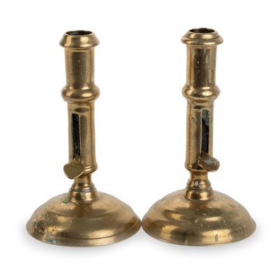 Lot 1424 - PAIR OF GEORGIAN BRASS CANDLESTICKS