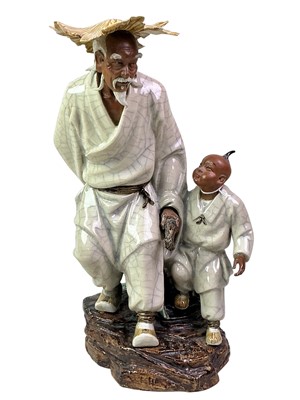 Lot 229 - CHINESE POTTERY FIGURE