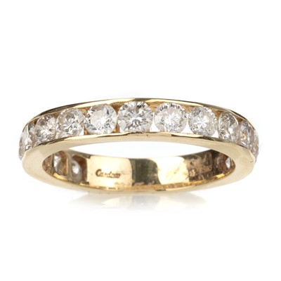 Lot 670 - DIAMOND HALF ETERNITY RING