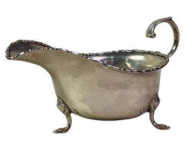 Lot 362 - EDWARDIAN SILVER SAUCE BOAT