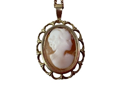 Lot 385 - TWO GOLD PENDANTS ON CHAINS