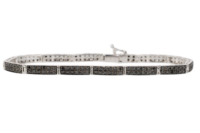 Lot 755 - BLACK AND WHITE DIAMOND TENNIS BRACELET