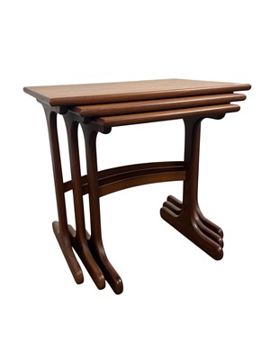 Lot 498 - MID CENTURY TEAK NEST OF THREE TABLES