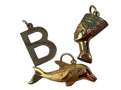 Lot 660 - THREE GOLD CHARMS/PENDANTS