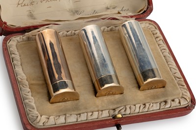 Lot 54 - FINE GEORGE V SCOTTISH SILVER TRIO OF PEPPER POTS