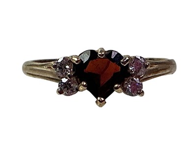 Lot 584 - GARNET AND CUBIC ZIRCONIA HEART SHAPED RING