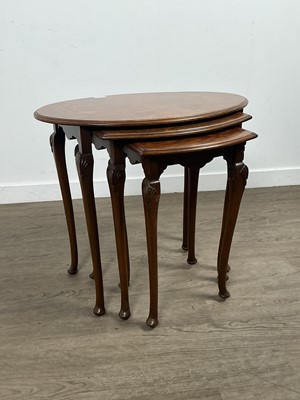 Lot 655 - NEST OF THREE WALNUT TEA TABLES
