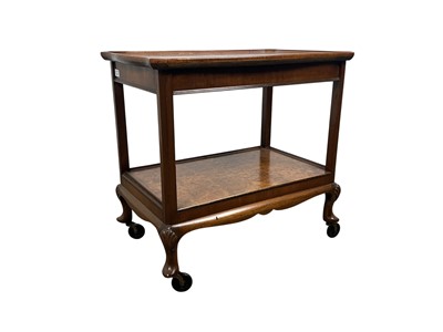 Lot 658 - GEORGE V WALNUT TEA TROLLEY