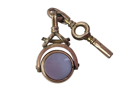 Lot 719 - GOLD PLATED WATCH KEY AND SWIVEL FOB