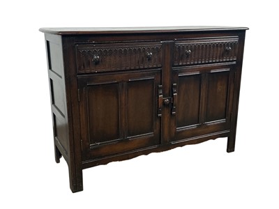 Lot 692 - ERCOL DARK OAK DINING SUITE