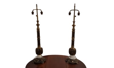 Lot 105 - PAIR OF EASTERN BRASS TABLE LAMPS
