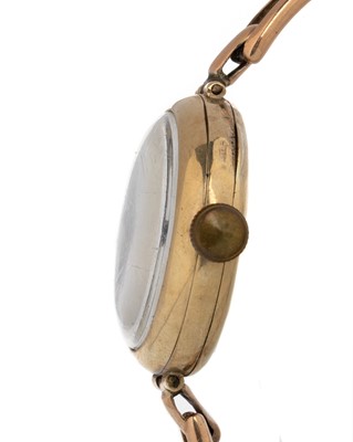 Lot 834 - NINE CARAT GOLD CASED MANUAL WIND WRIST WATCH