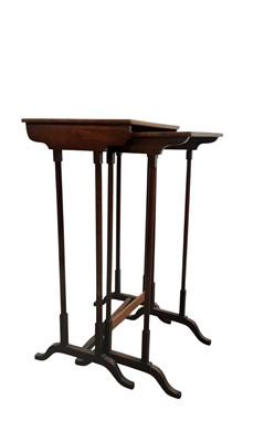 Lot 699 - NEST OF TWO WALNUT TABLES