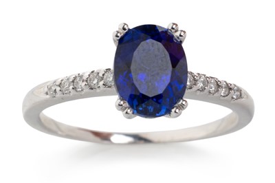 Lot 627 - SYNTHETIC SAPPHIRE AND DIAMOND RING