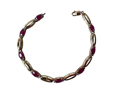 Lot 42 - RUBY AND DIAMOND BRACELET