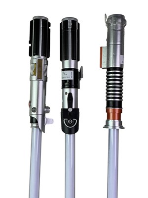 Lot 73 - THREE MODEL LIGHTSABERS