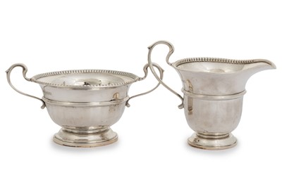 Lot 105 - GEORGE V SILVER SUGAR AND CREAM SET