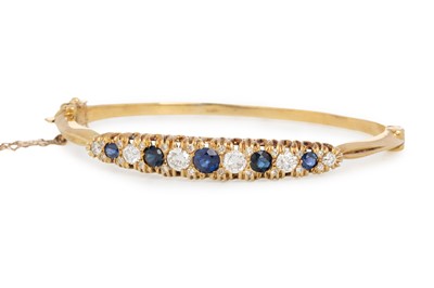 Lot 737 - SAPPHIRE AND DIAMOND BANGLE