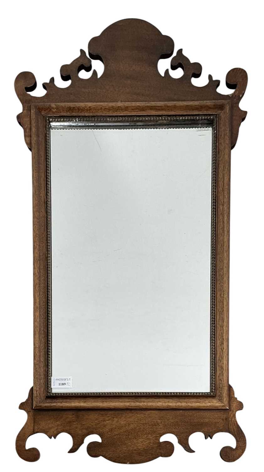 Lot 1686 - TWO MAHOGANY FRET CARVED WALL MIRRORS